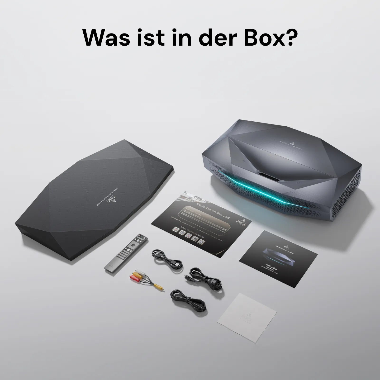 AWOL Vision Aetherion Max 4K RGB Laser Ultrakurzdistanz Beamer mit Zubehör, Fernbedienung und Anschlusskabeln im Lieferumfang.