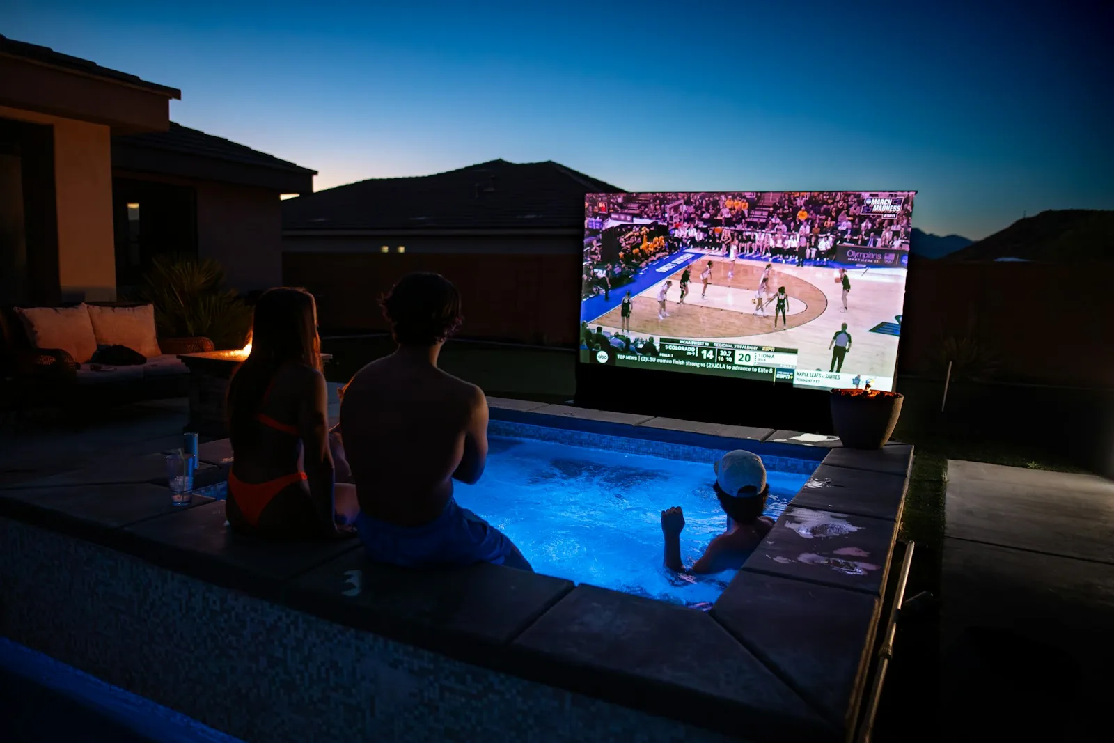 People watching a large-format projection